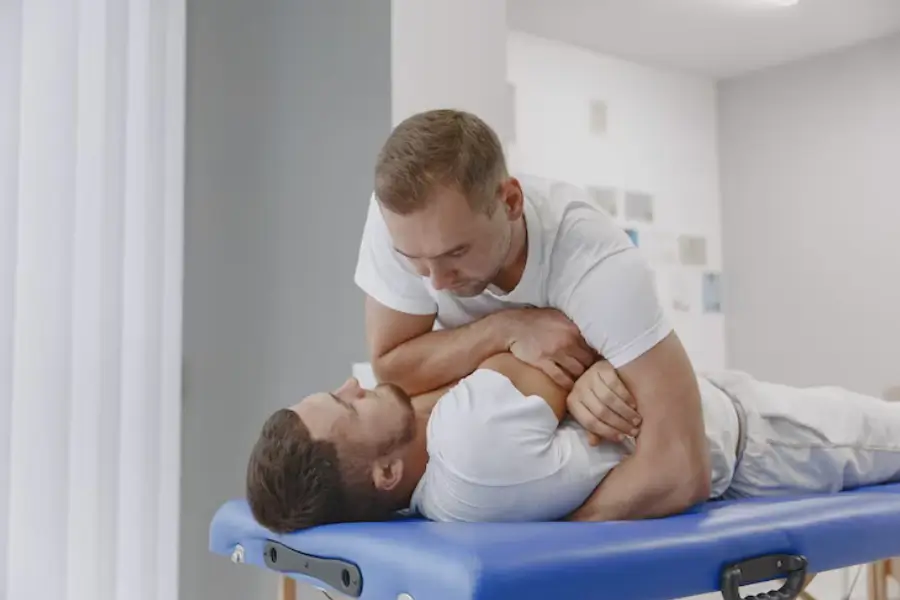 Chiropractor consultation with patient in Logan Utah