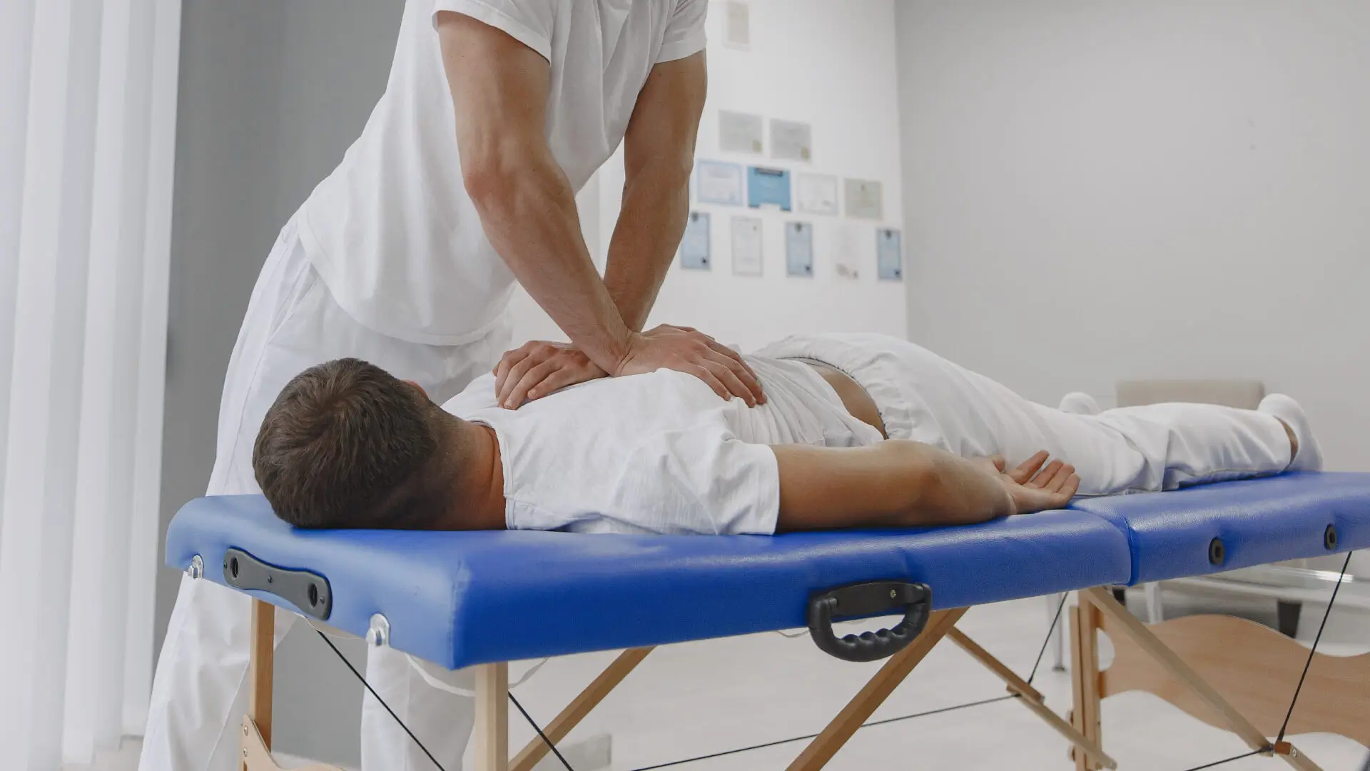 Chiropractor consultation with patient in Logan Utah
